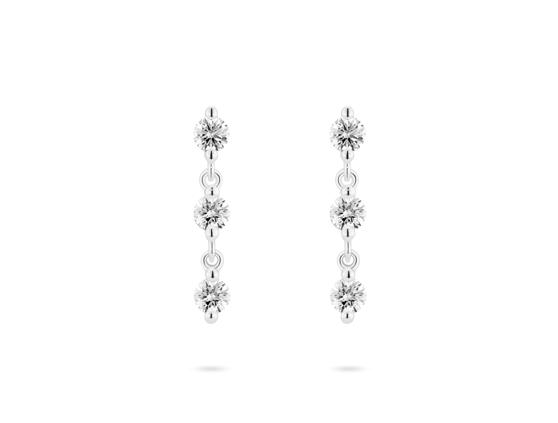 Front view of 0.9 carat total weight line drop earrings in 14k white gold