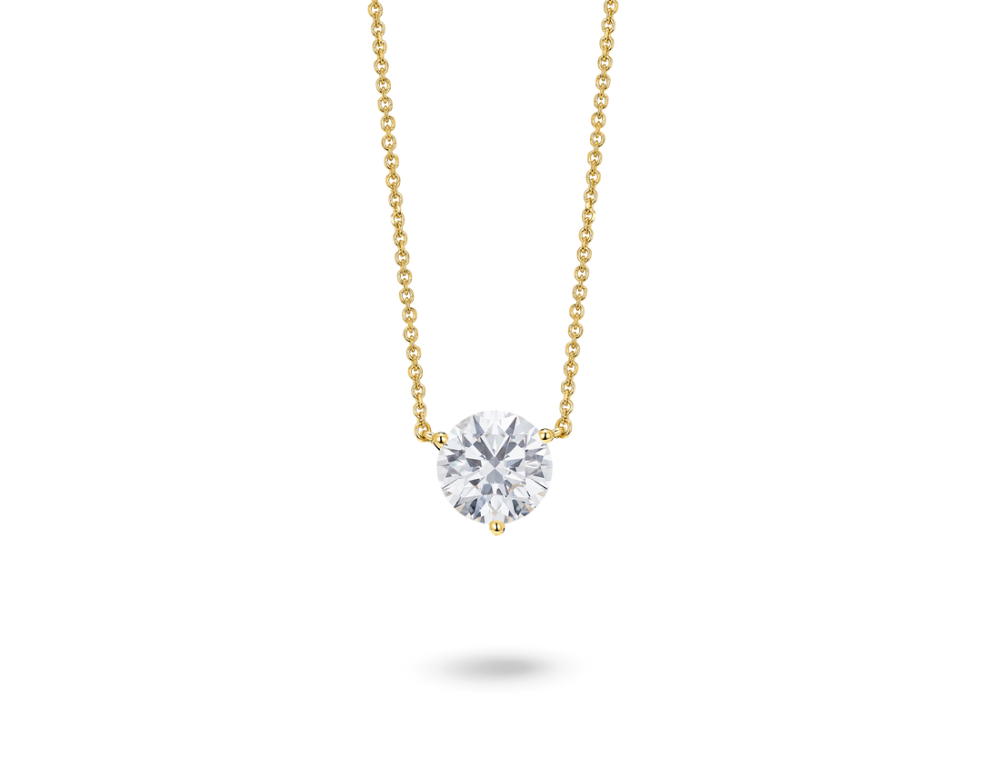 Front view of a lab-grown white 1.5 carat total weight round brilliant solitaire pendant in 14k yellowgold