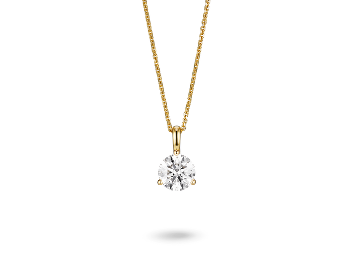 Front view of a lab-grown 1 carat round brilliant solitaire on a bale pendant in yellow gold