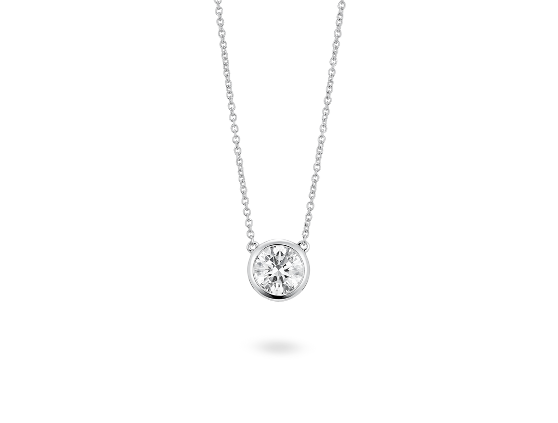 Front view of 1 carat round brilliant bezel pendant in 14k white gold