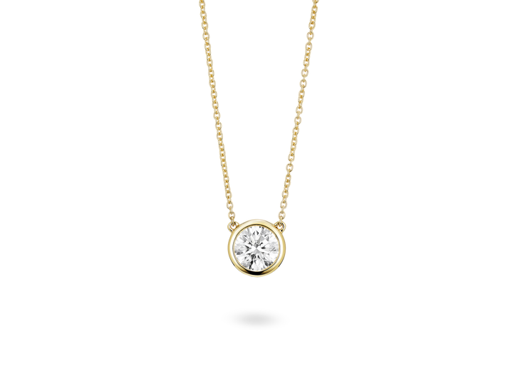 Front view of 1 carat round brilliant bezel pendant in 14k yellow gold