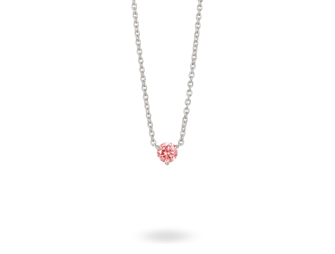 Front view of a pink 0.5 carat round brilliant solitaire pendant in 14k white gold